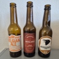 Drei unterschiedliche Bierflaschen